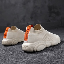 Spring breathable fly woven men's shoes lazy casual tennis shoes Korean thin sports tennis shoes